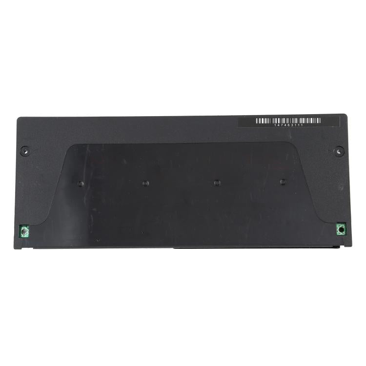 Game console power supply cover panel with mounting screw holes