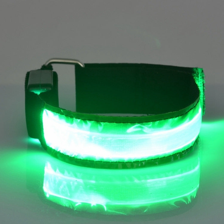 Rechargeable LED safety wrist belt with bright green glowing strip and reflective edges