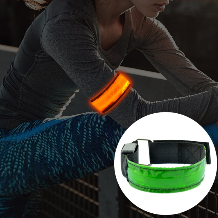 Rechargeable LED safety wrist belt with orange LED glow and green reflective strap