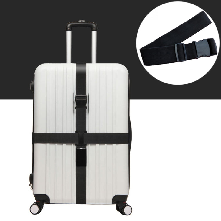 Black elastic luggage packing strap with adjustable buckle on suitcase