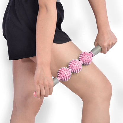 Triple hedgehog massage stick with pink spiky rollers and gray handles for leg use