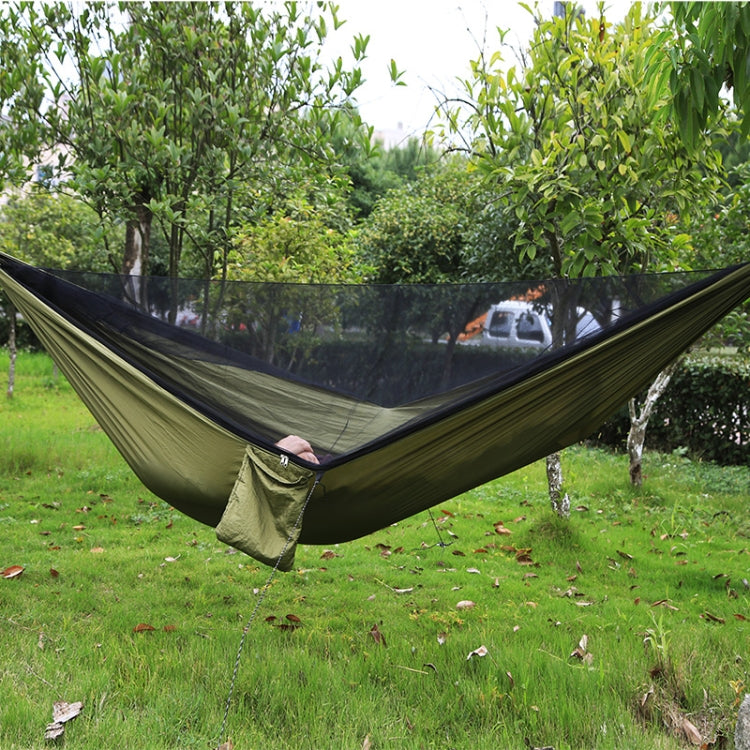 Army green parachute hammock with black mosquito net, open ends and hanging pouch