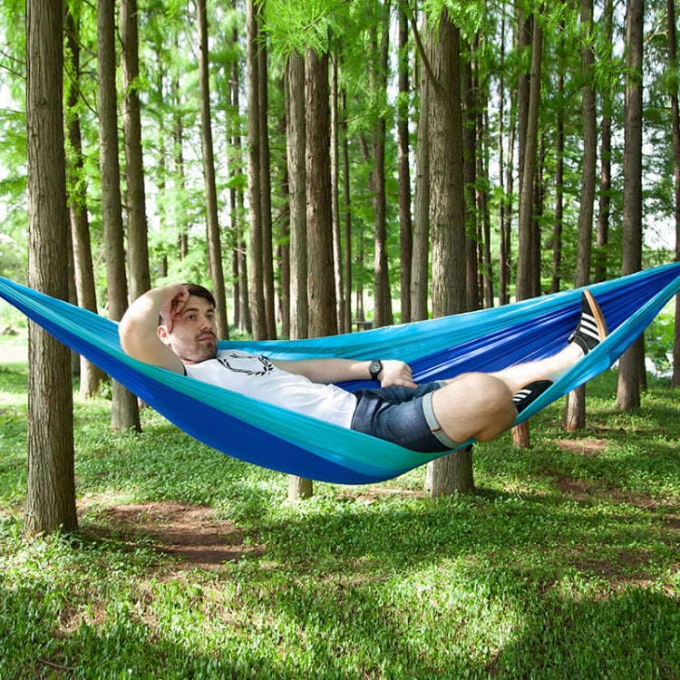Blue parachute hammock swing for one person, outdoor hanging bed