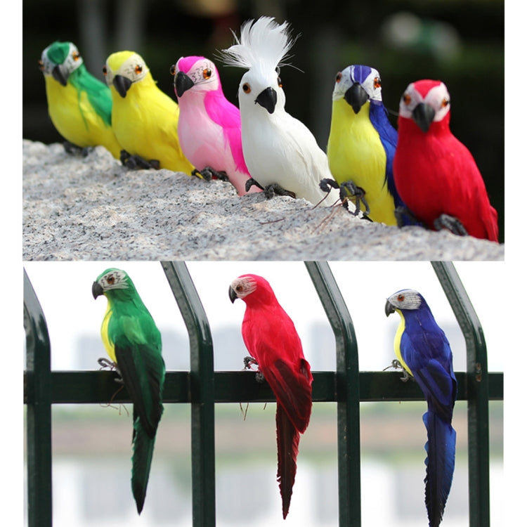 Set of colorful simulated parrot ornaments in yellow, green, pink, blue, and red