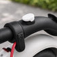 White silicone cover for rear fender hook on an electric scooter handlebar