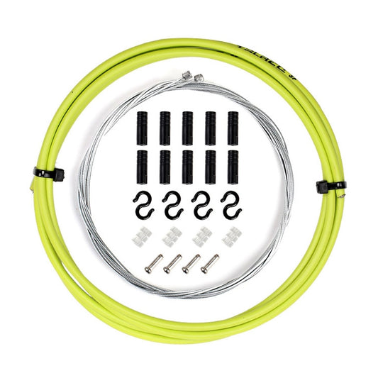 Bicycle shift cable kit with lime green housing, steel cables, and assorted fittings