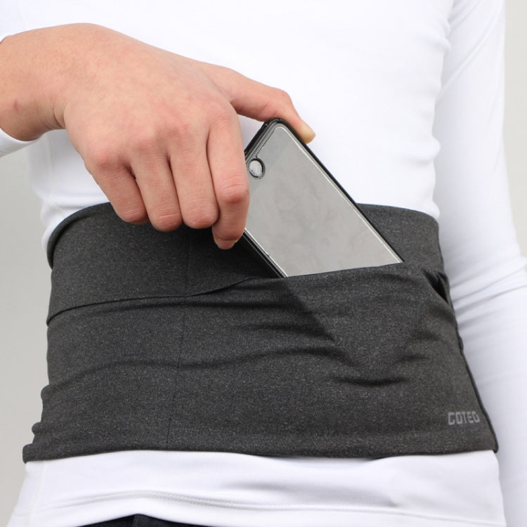 Dark grey XL stretch phone pocket bag with smartphone tucked inside, worn at waist