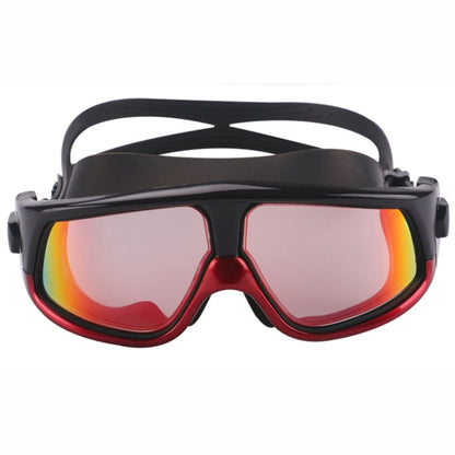 Red and black anti-fog swim goggles with large mirrored lenses and silicone strap