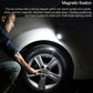 Emergency survival hammer with bright white light positioned near a vehicle wheel