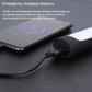 Emergency survival hammer charging a smartphone with visible charging cable and indicator light