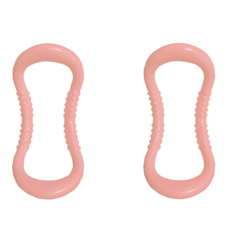 Pair of light pink massage yoga rings with textured raised massage ridges