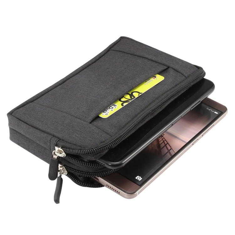 Dark gray phone waist bag with open top and cards or phone inside