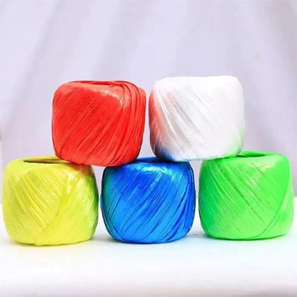 Plastic packing rope spool set, red, white, yellow, blue, green, wrapped cord rolls