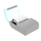 White thermal paper roll loaded in a thermal printer, ready to print receipts