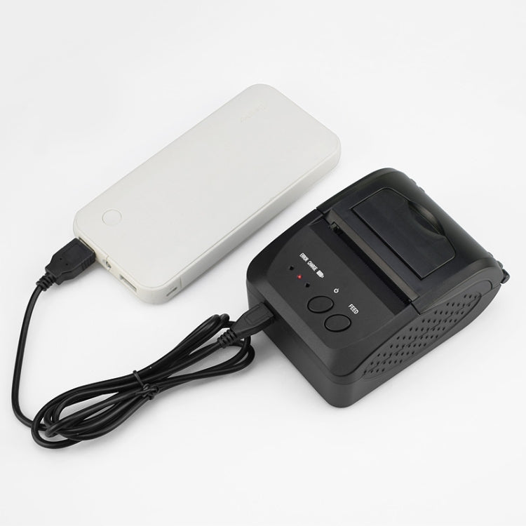 Portable thermal printer kit: black printer dock and white power bank with connected cables.