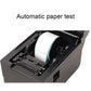 Black thermal barcode printer with paper loaded and visible internal rollers.