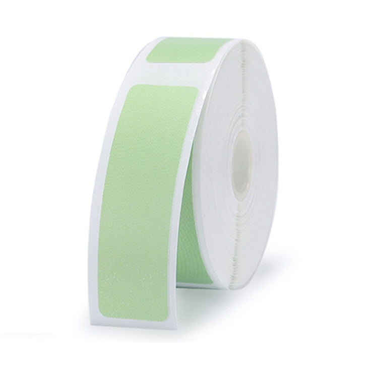 Green barcode label printing paper roll with rectangular label sections