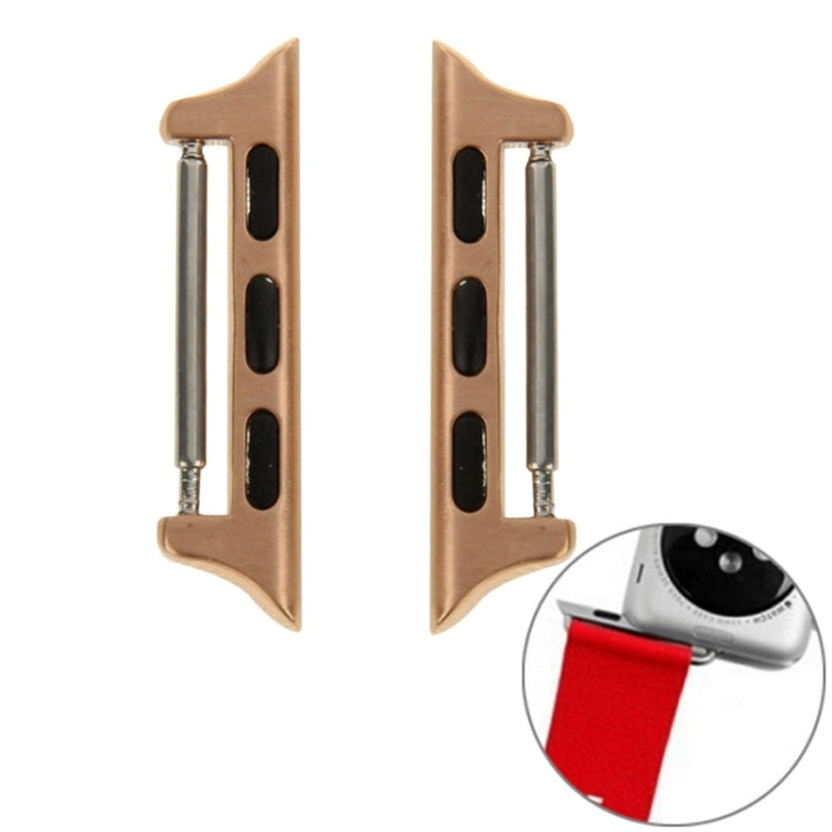 Gold metal Apple Watch strap connectors with silver pins and buckle-style frames
