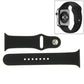 Black rubber sport watch band with pin-and-tuck closure, band parts laid out