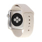 Beige rubber sport watch band with pin-and-tuck closure shown on Apple Watch
