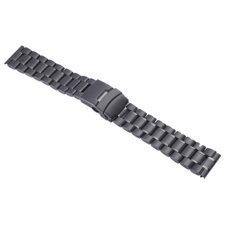 Black metal link watch band laid flat with sliding clasp center