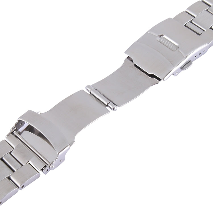 Close-up of stainless steel classic buckle and clasp plate on watch band
