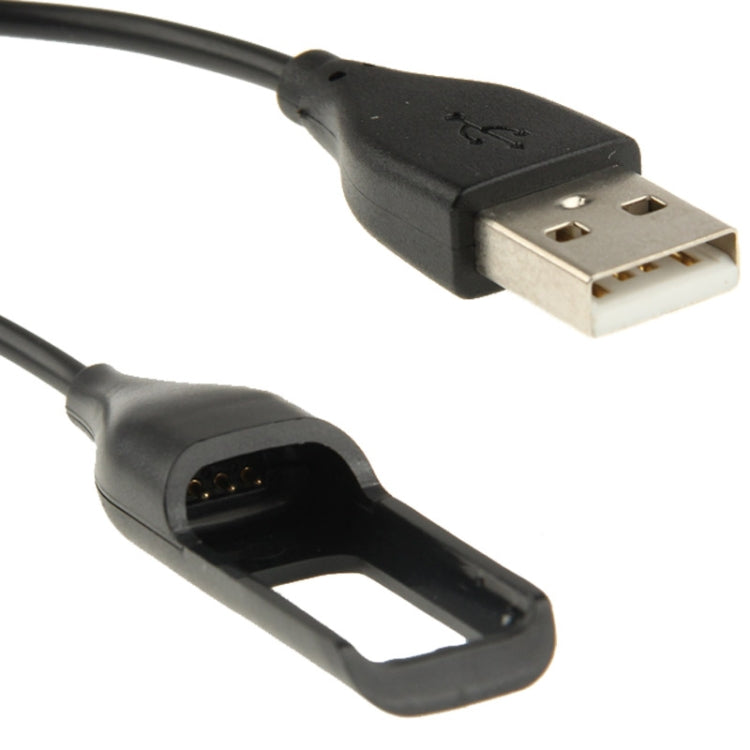 USB end and charging clip connector on black charging cable