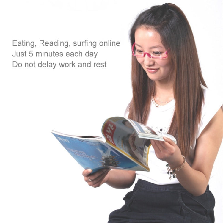 Double eyelid trainer glasses with pink frame on person reading