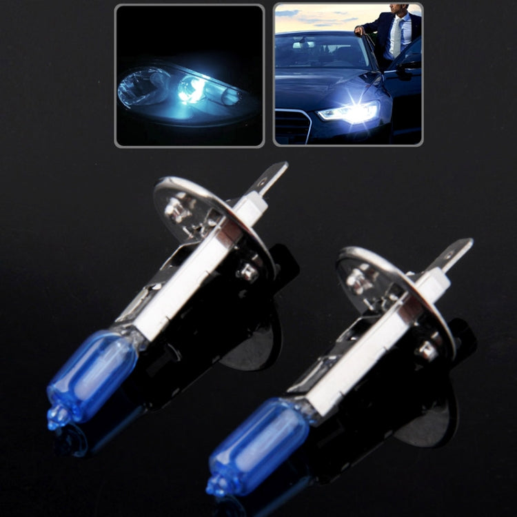 Pair of halogen headlight bulbs with blue glass tubes and silver metal caps