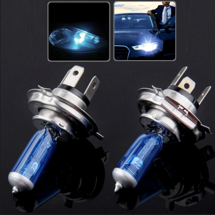 Pair of halogen headlight bulbs with blue glass tubes and silver metal mounting tabs