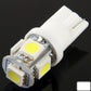 Yellow T10 LED signal bulb with three SMD LED chips and white wedge base