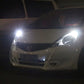 LED car signal light bulbs installed on a car, bright white beam in front