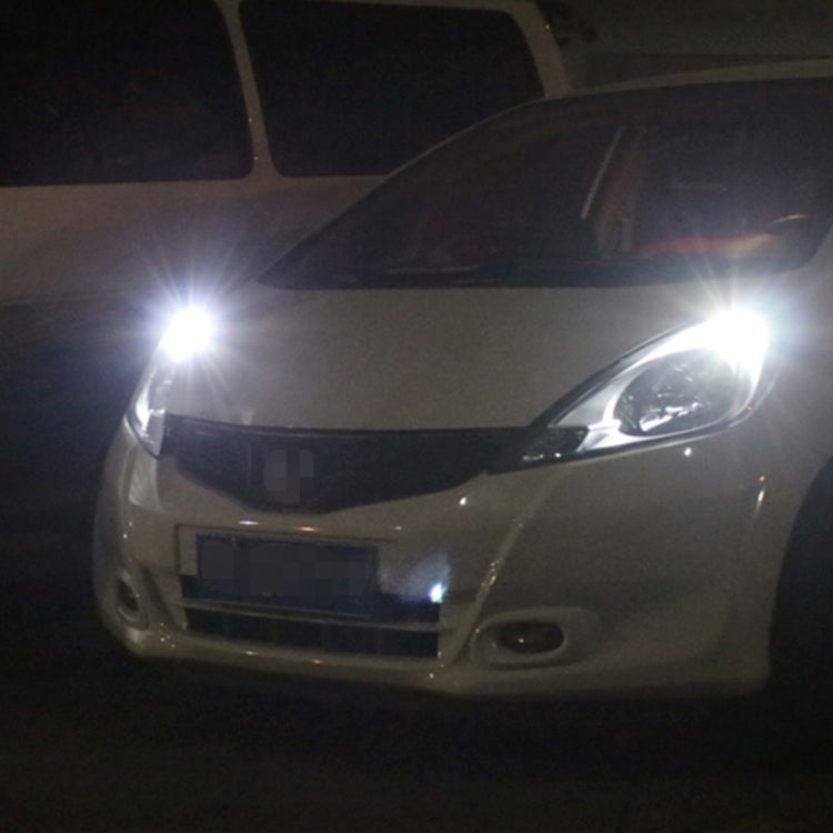 LED car signal light bulbs installed on a car, bright white beam in front