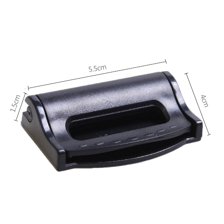 Black car seat belt adjuster clip with open latch, side view