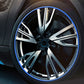 Blue wheel rim trim ring around black alloy wheel