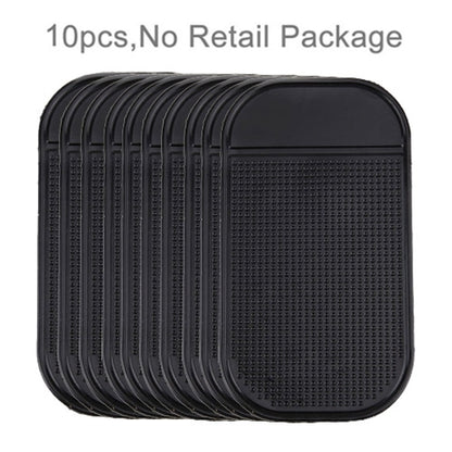 Set of black anti-slip car sticky mats with textured dotted grip surface