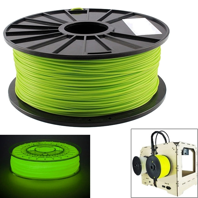 Green luminous PLA filament spool on black reel