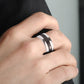 20mm magnetic metal ring worn on finger with dark stripe accent