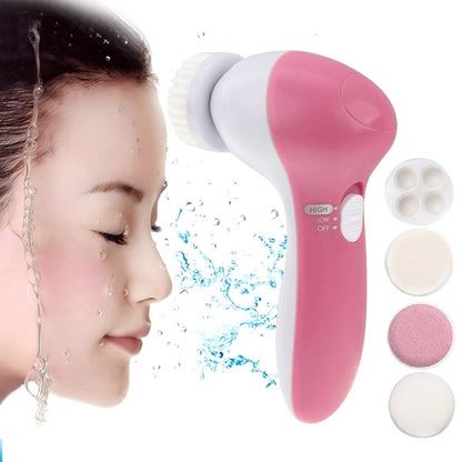 Pink and white electric facial cleansing brush with rotating silicone scrub head