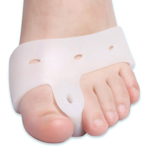 Close-up of white hallux valgus toe brace over the toes