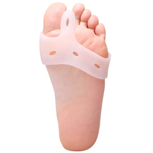 White hallux valgus toe brace worn on the foot, side view