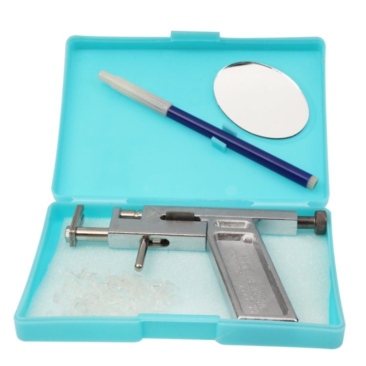 Turquoise piercing kit case with round ear mirror and metal gun parts