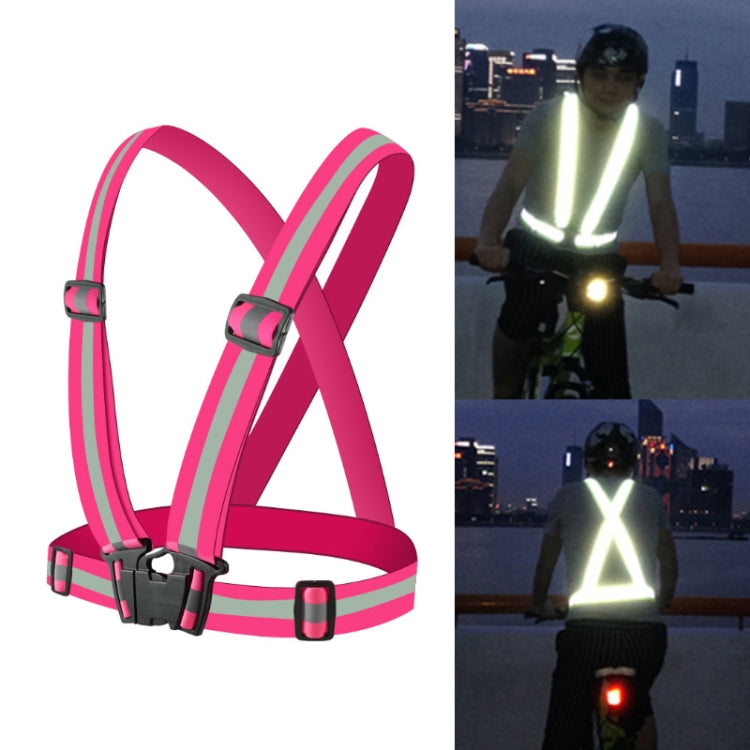 Magenta reflective running safety vest with cross-back straps and elastic waist loops