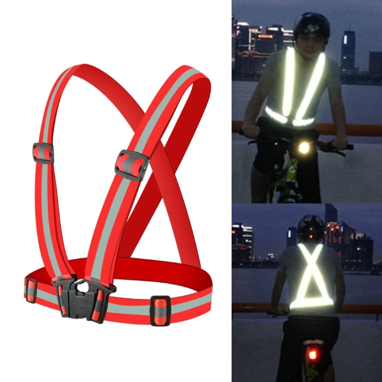 Red reflective running safety vest with crossed shoulder straps and front fastening buckle