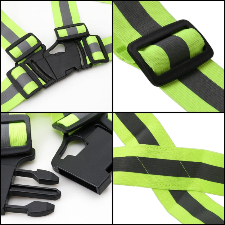 Neon green safety vest close-up of black buckles and reflective strap edges
