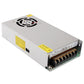 Regulated DC switching power supply with cooling fan grille and side terminals