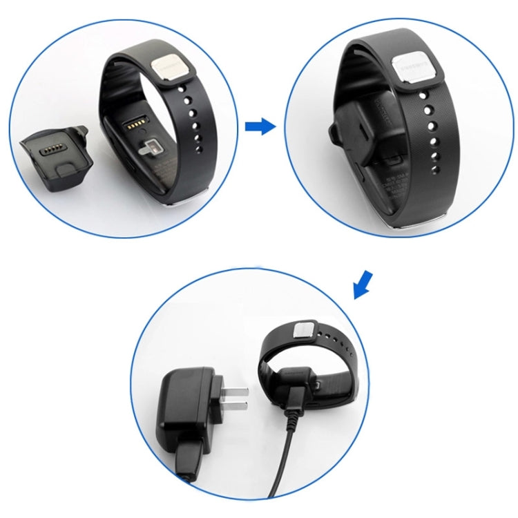 Bracelet charger kit showing black dock, strap, and connected cable