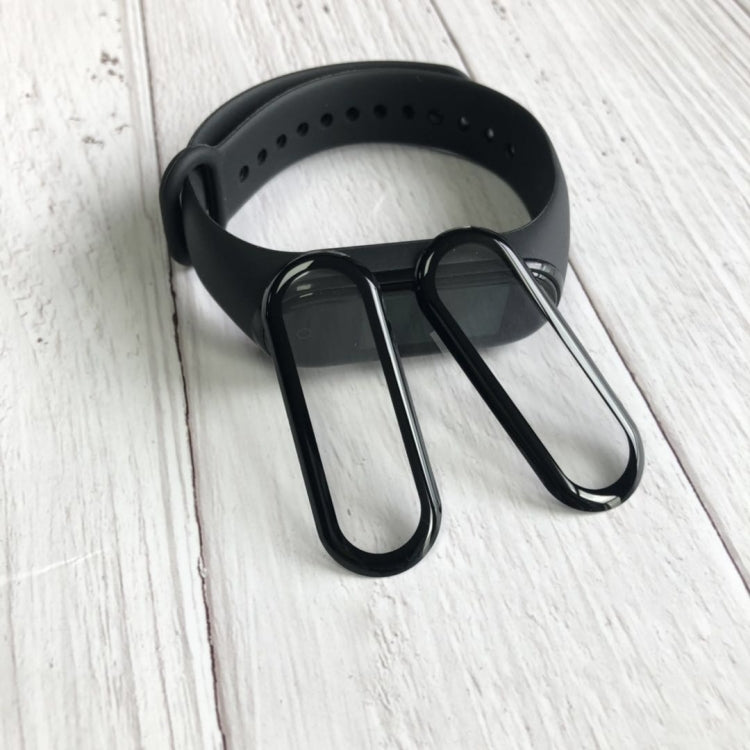 Protective screen film for Xiaomi smart watch on black watch body, curved edges