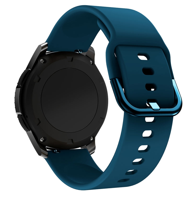 Teal silicone smartwatch strap with metal buckle and perforated strap holes