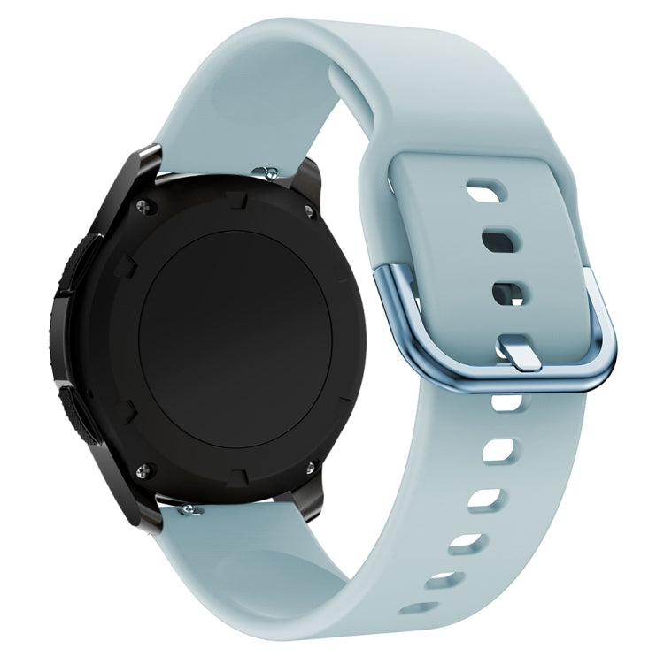 Light blue silicone watch band with metal buckle and perforated strap holes